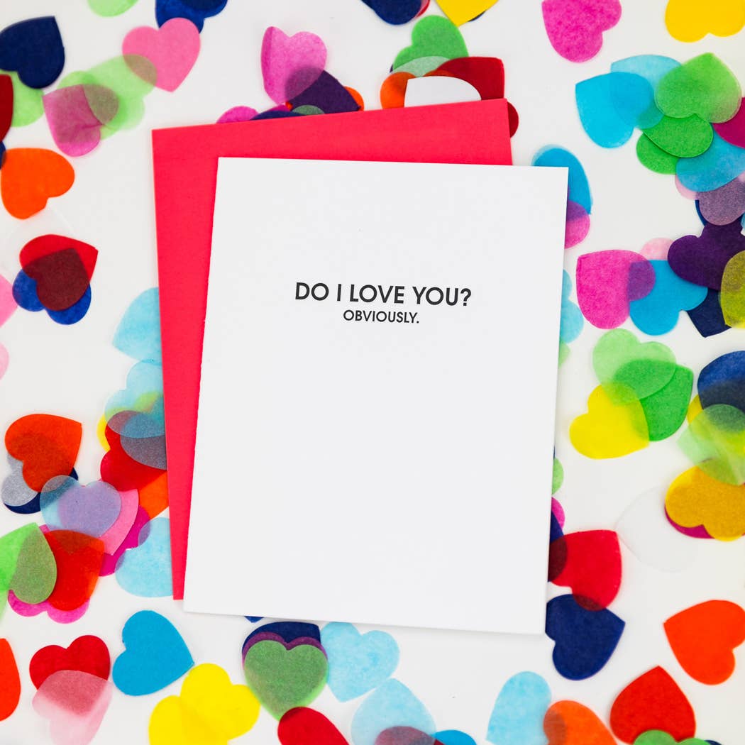 White card with "Do I love you? Obviously" in black text.  Neon red envelope.