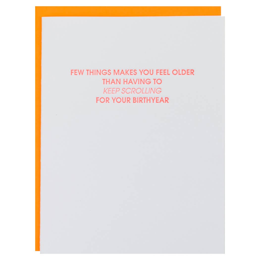 White card with "Few things makes you feel older than having to keep scrolling for your birthyear" in neon red lettering.  Neon orange envelope.