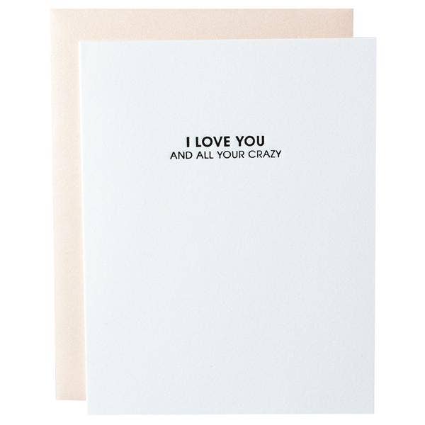 White card with "I love you and all your crazy" in black lettering. Pearl pink envelope.