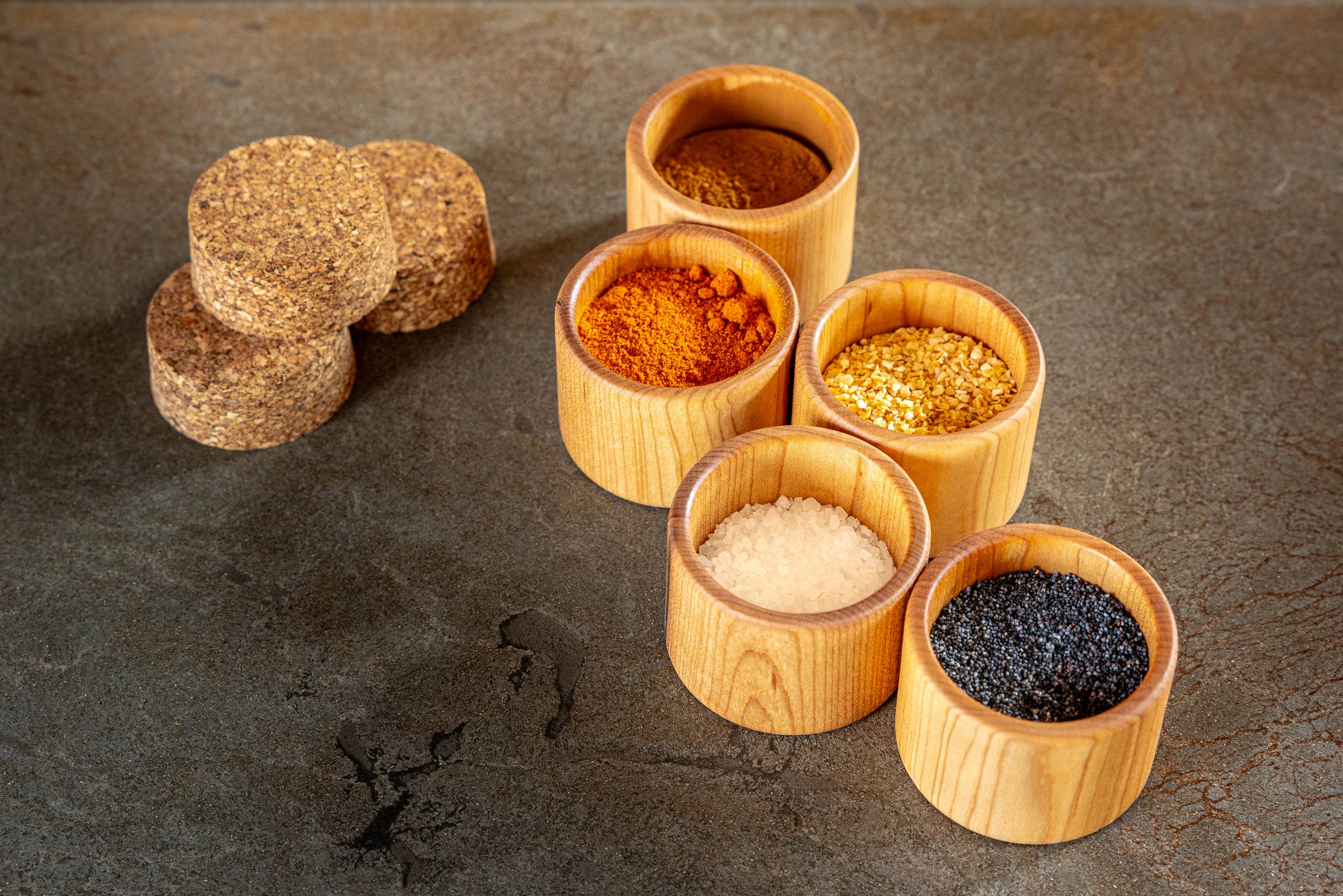 Maple wood round cup for salt cellar or spices.  Cork top to keep contents fresh. 5 cups filled with spices