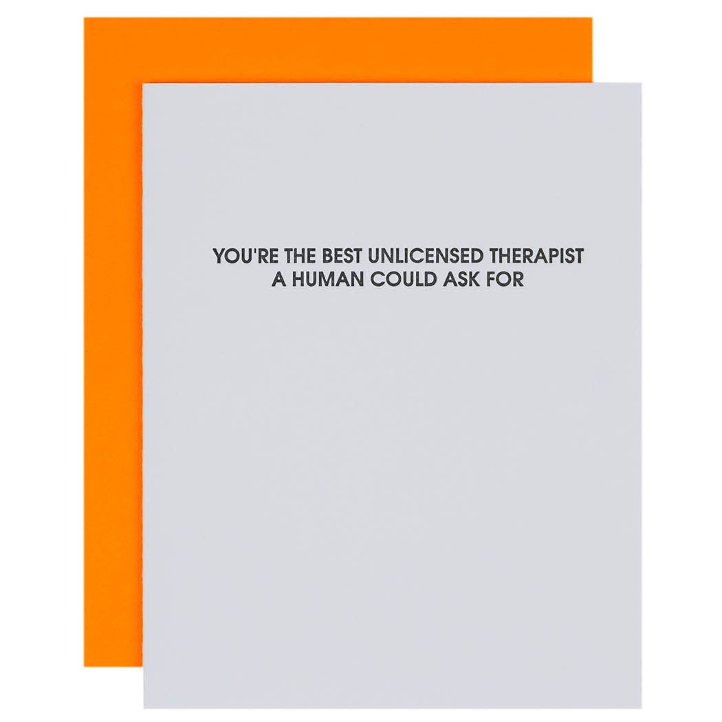 White card with black text "You're the best unlicensed therapist a human could ask for".  Fluorescent orange envelope.