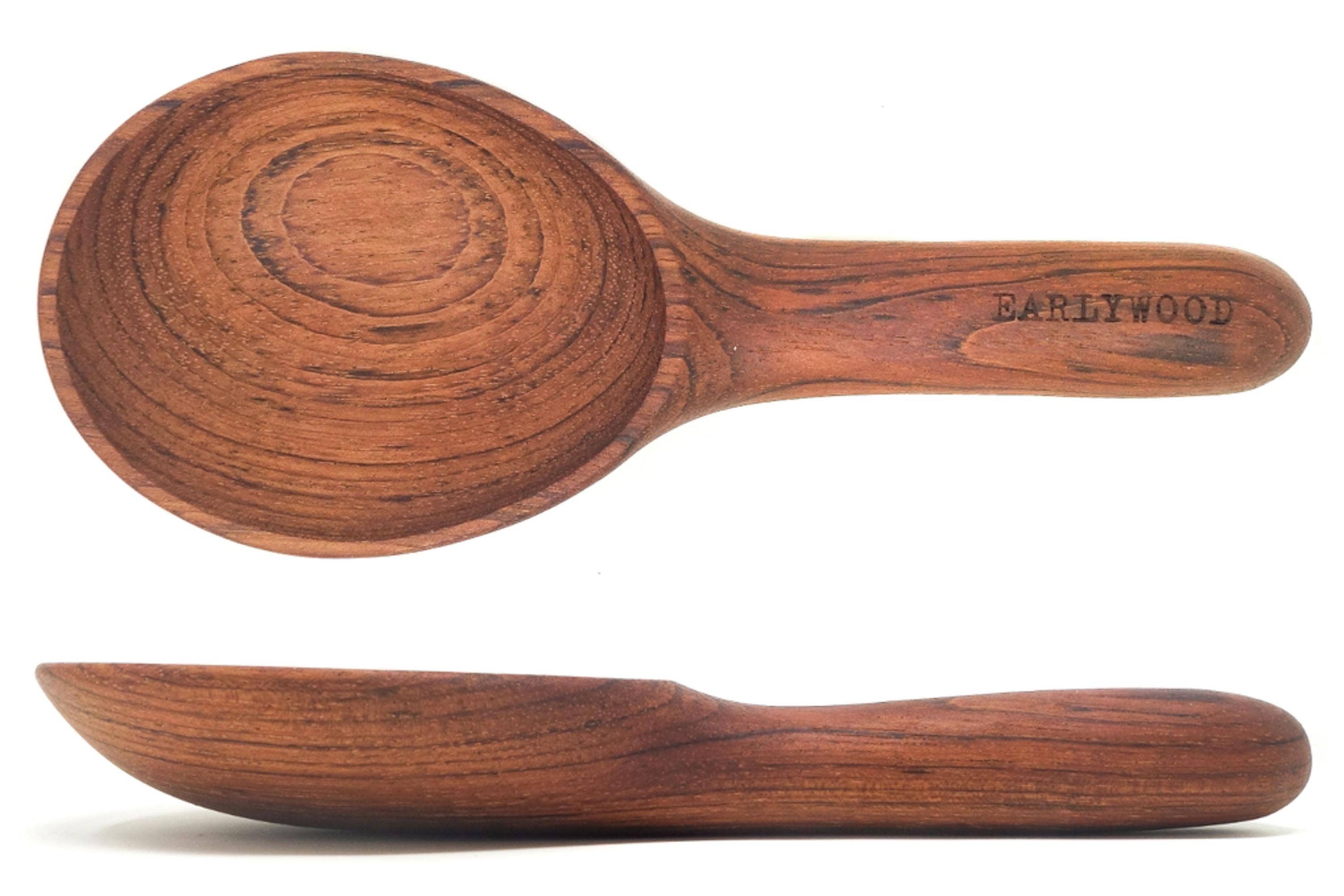 Short handled wood spoon from top view and side to show lays flat