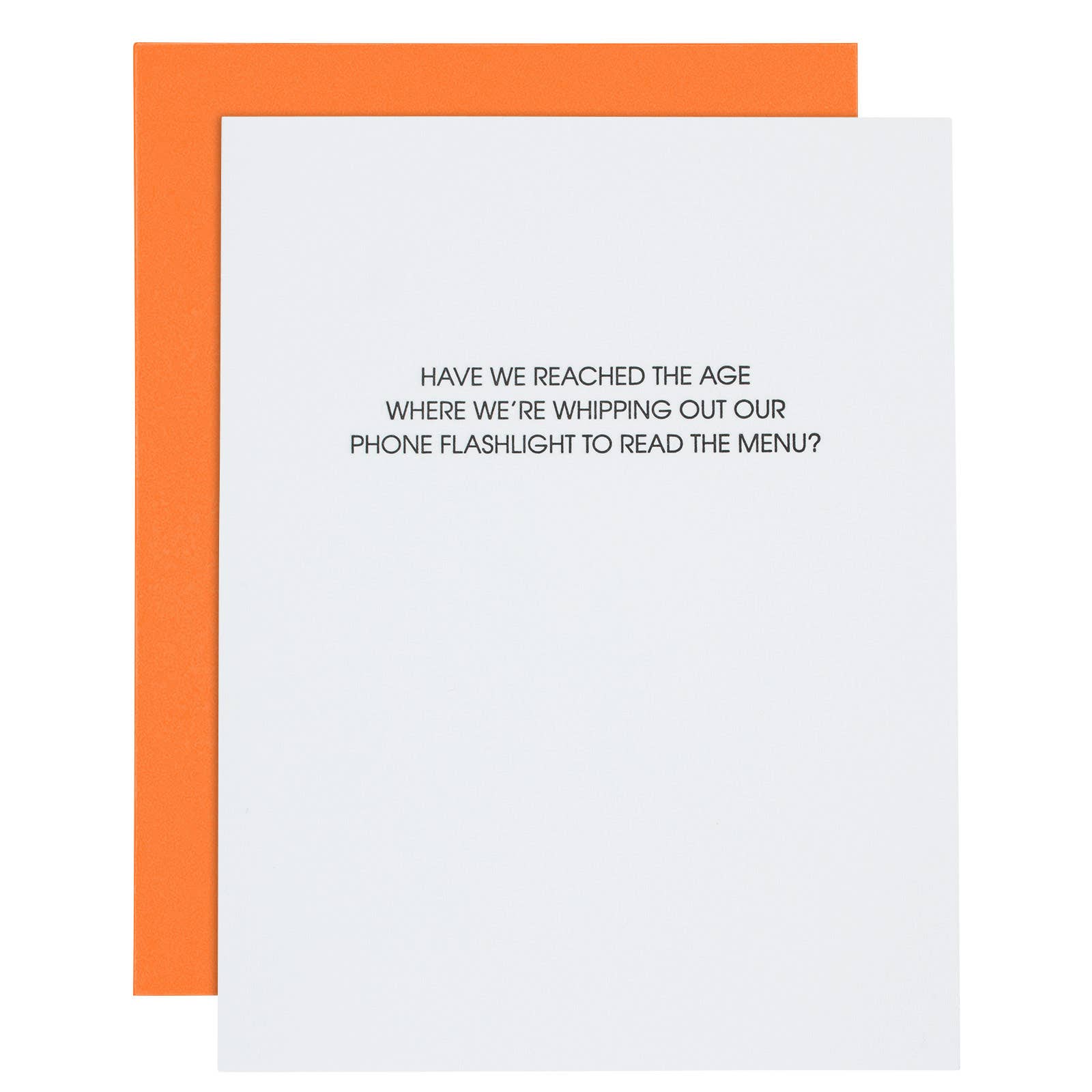 White card with black text "Have we reached the age where we're whipping out our phone flashlight to read the menu?". fluorescent orange envelope. 