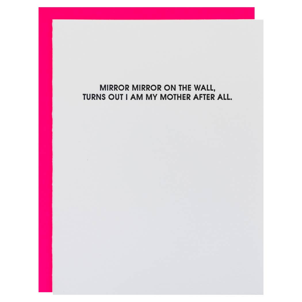 White card with "Mirror mirror on the wall, turns out I am my mother after all." in black lettering. Neon pink envelope.