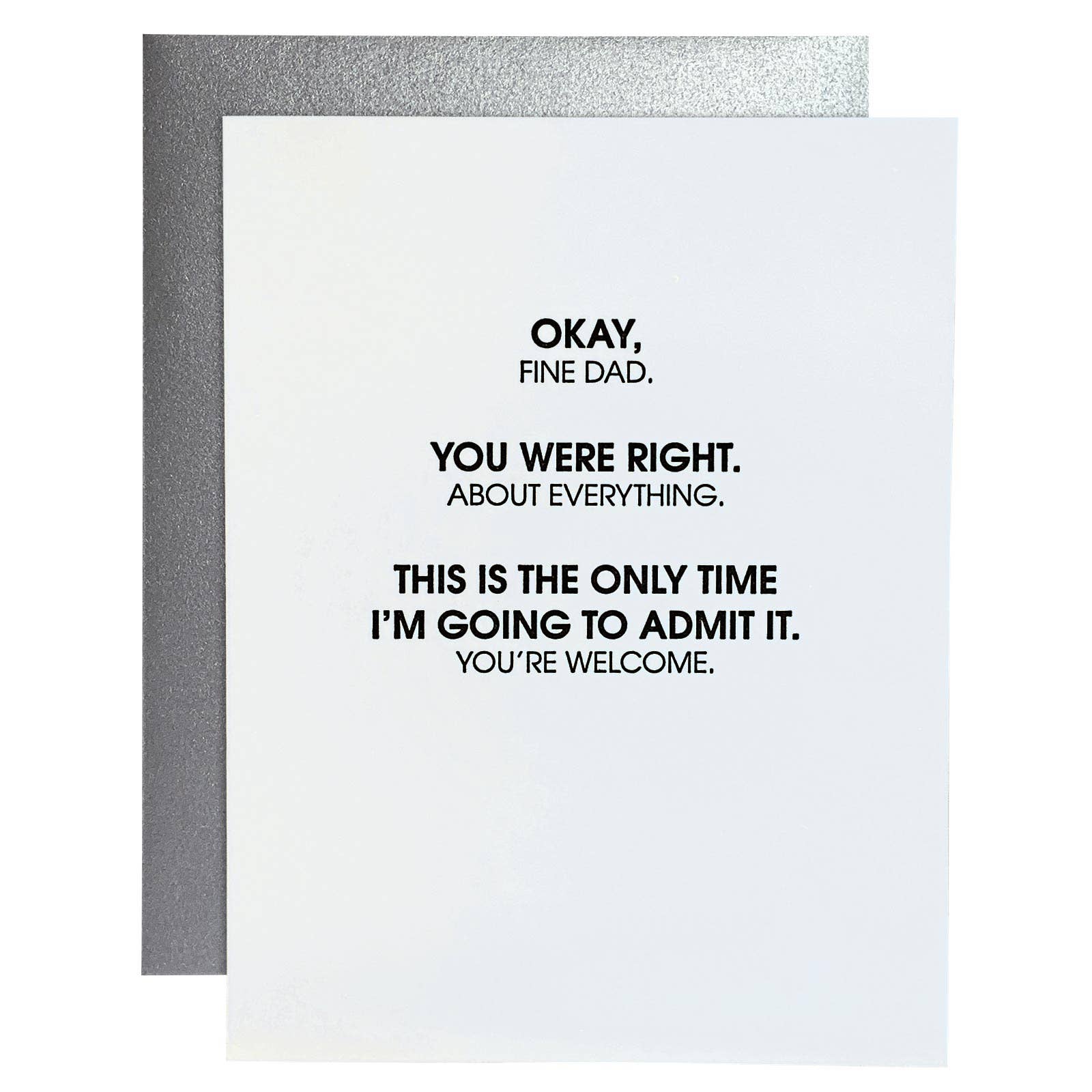 White card with "Okay, fine Dad. You were right. About everything. This is the only time I'm going to admit it. You're welcome." in black lettering. Silver envelope.