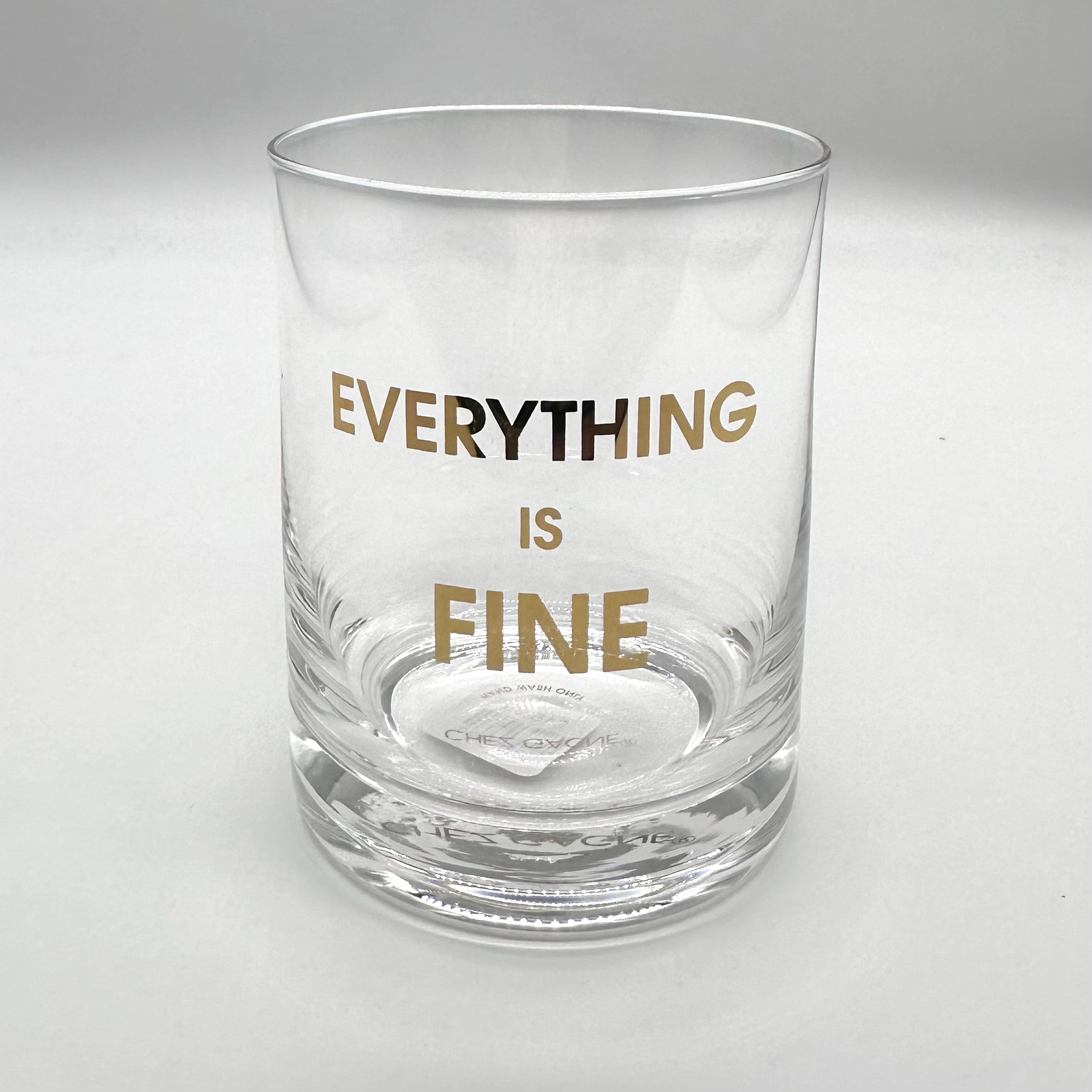 Clear rocks glass with "EVERYTHING IS FINE" in gold lettering.