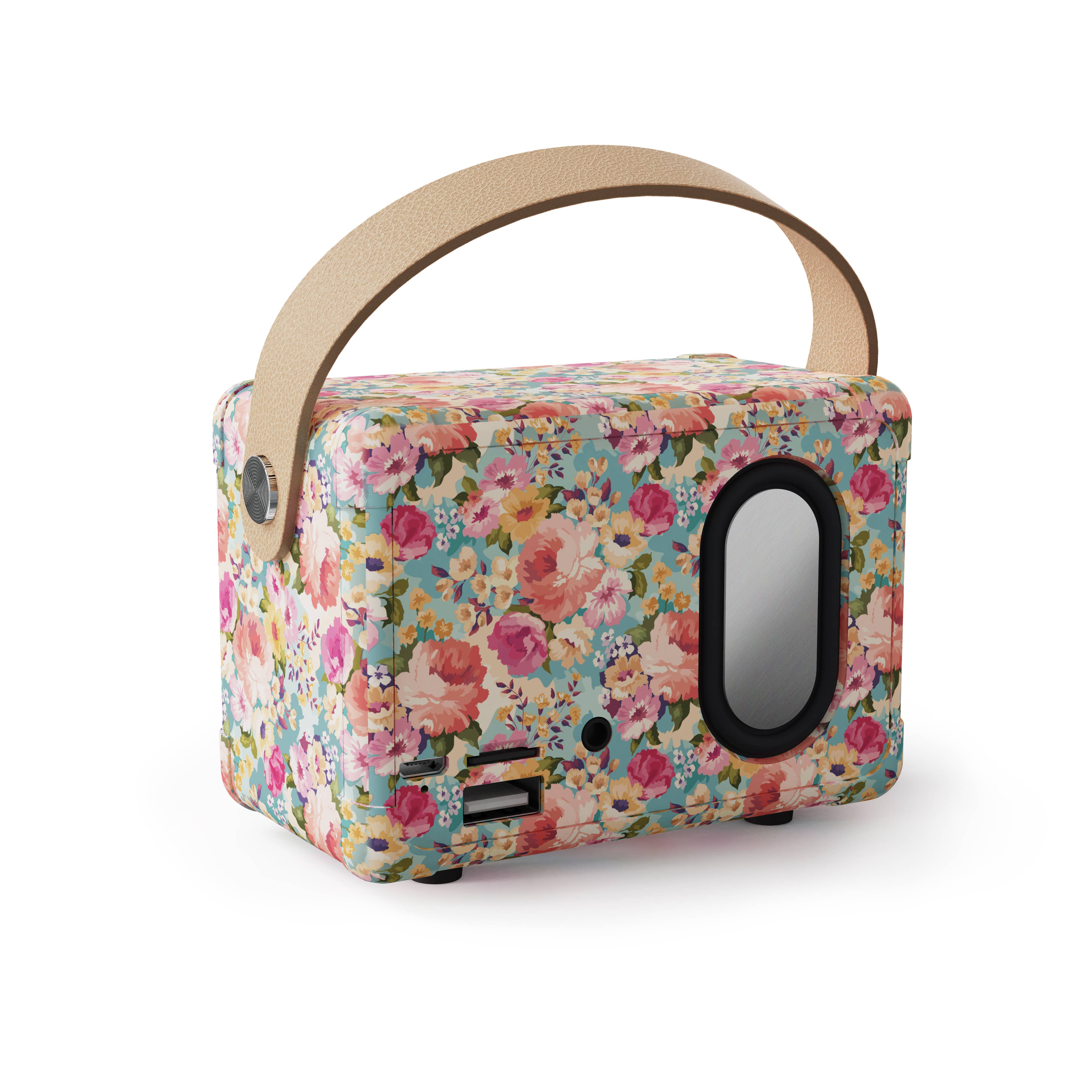 Backside of retro radio inspired Bluetooth speaker, with floral pattern and charging port 