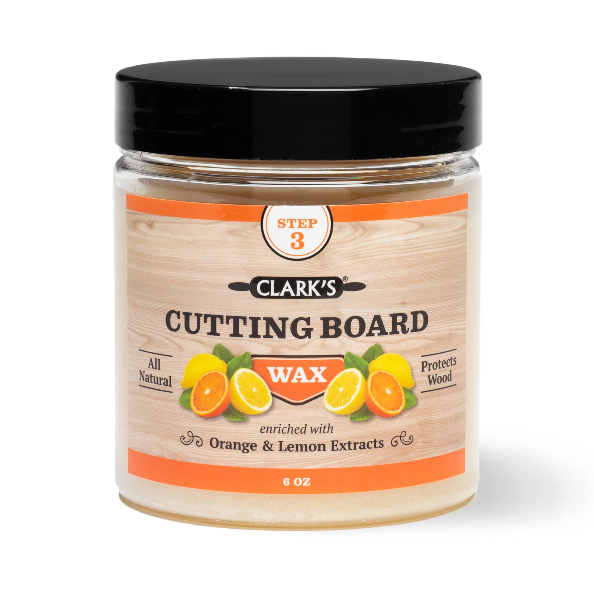 Clear plastic tub with black lid. Label with brown wood background and citrus fruits. 