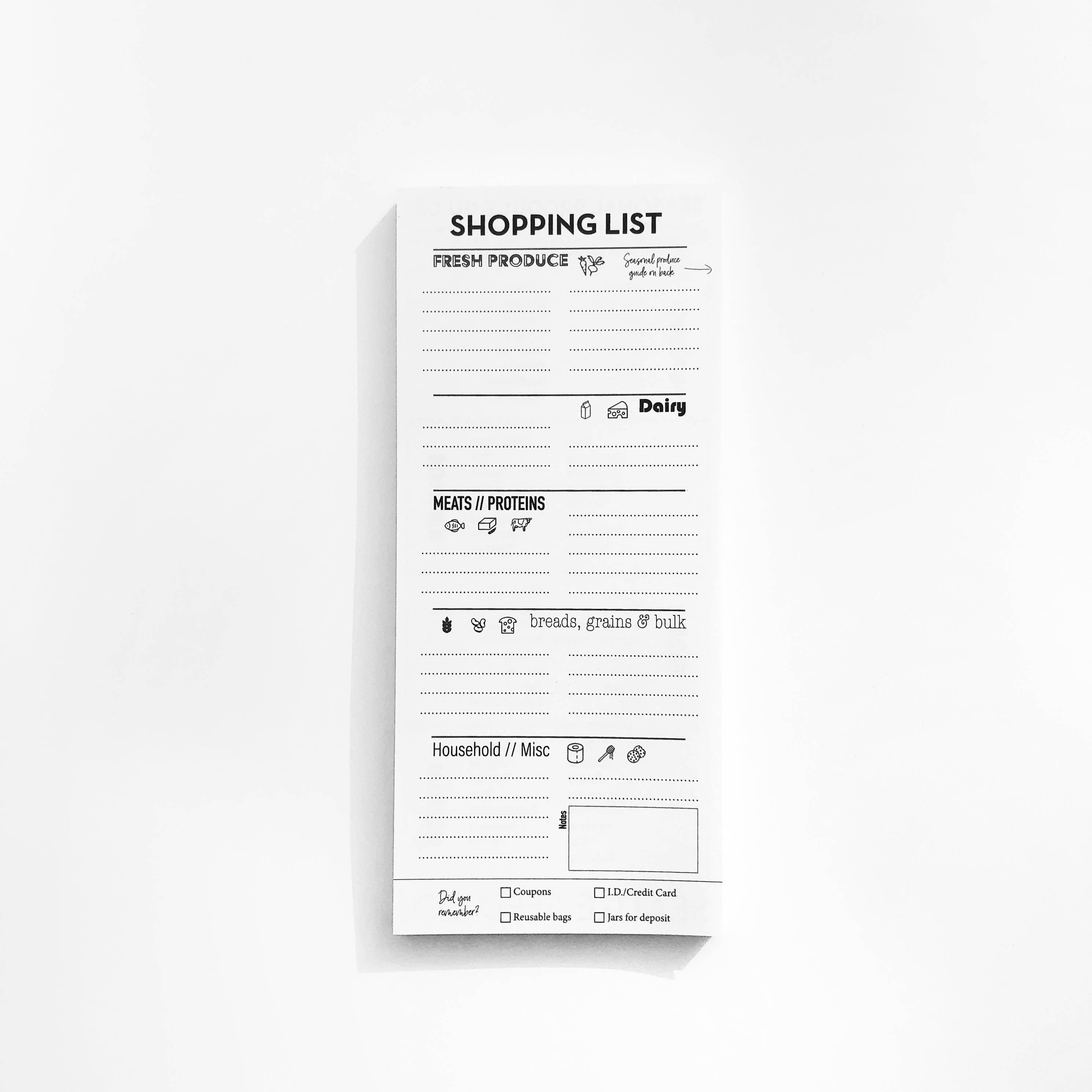 Paper pad of shopping list prompts, space to write in the following categories: Fresh Produce, Dairy, Meats/Proteins, breads grains and bulk, household/misc